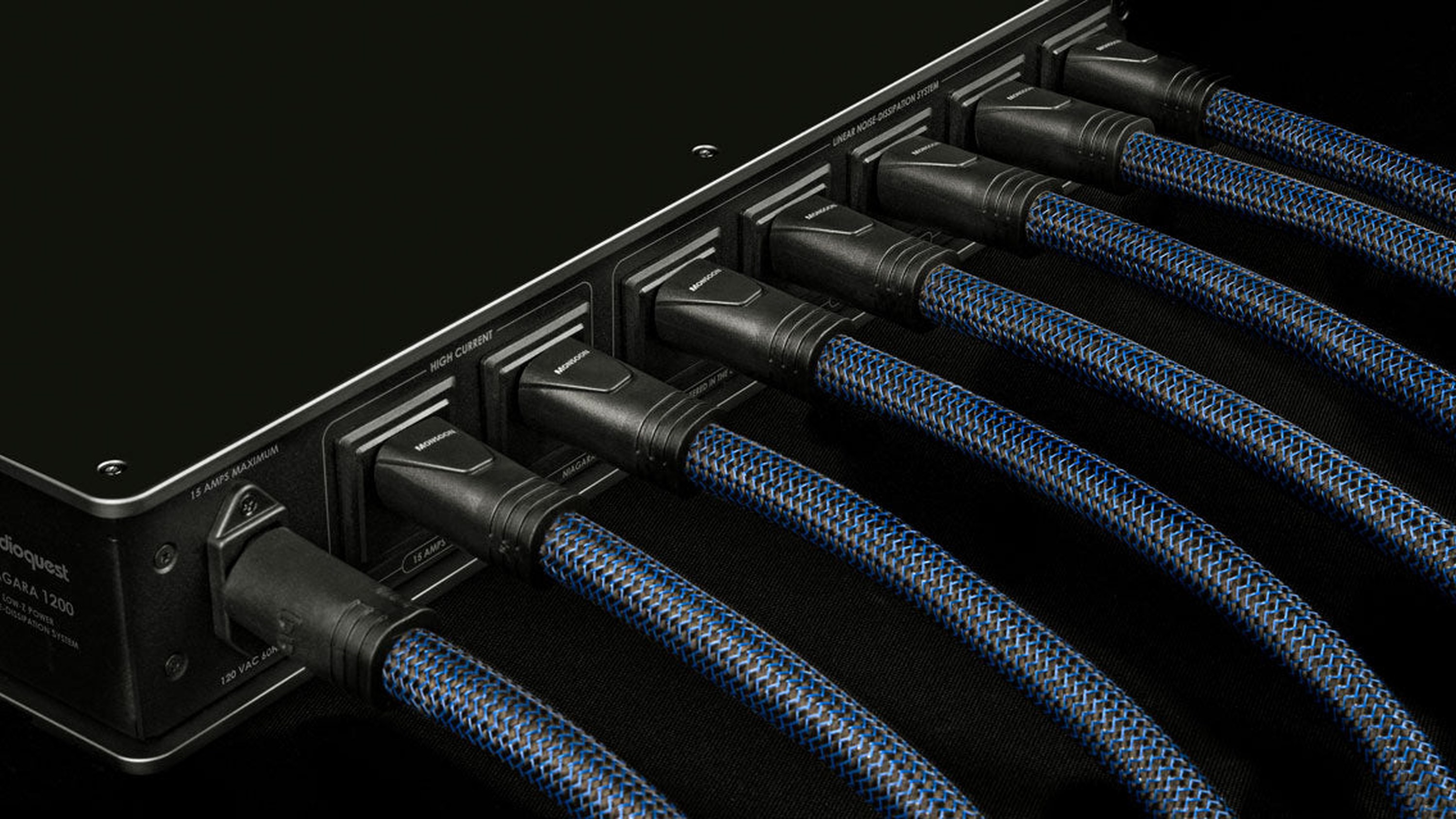 AudioQuest cables connected to a rack of equipment
