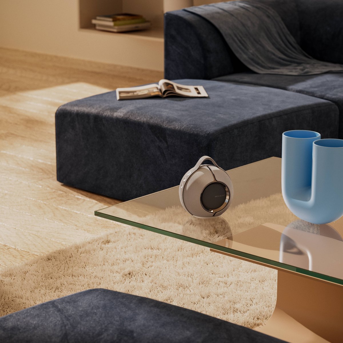 Devialet Mania portable speaker on a living room table