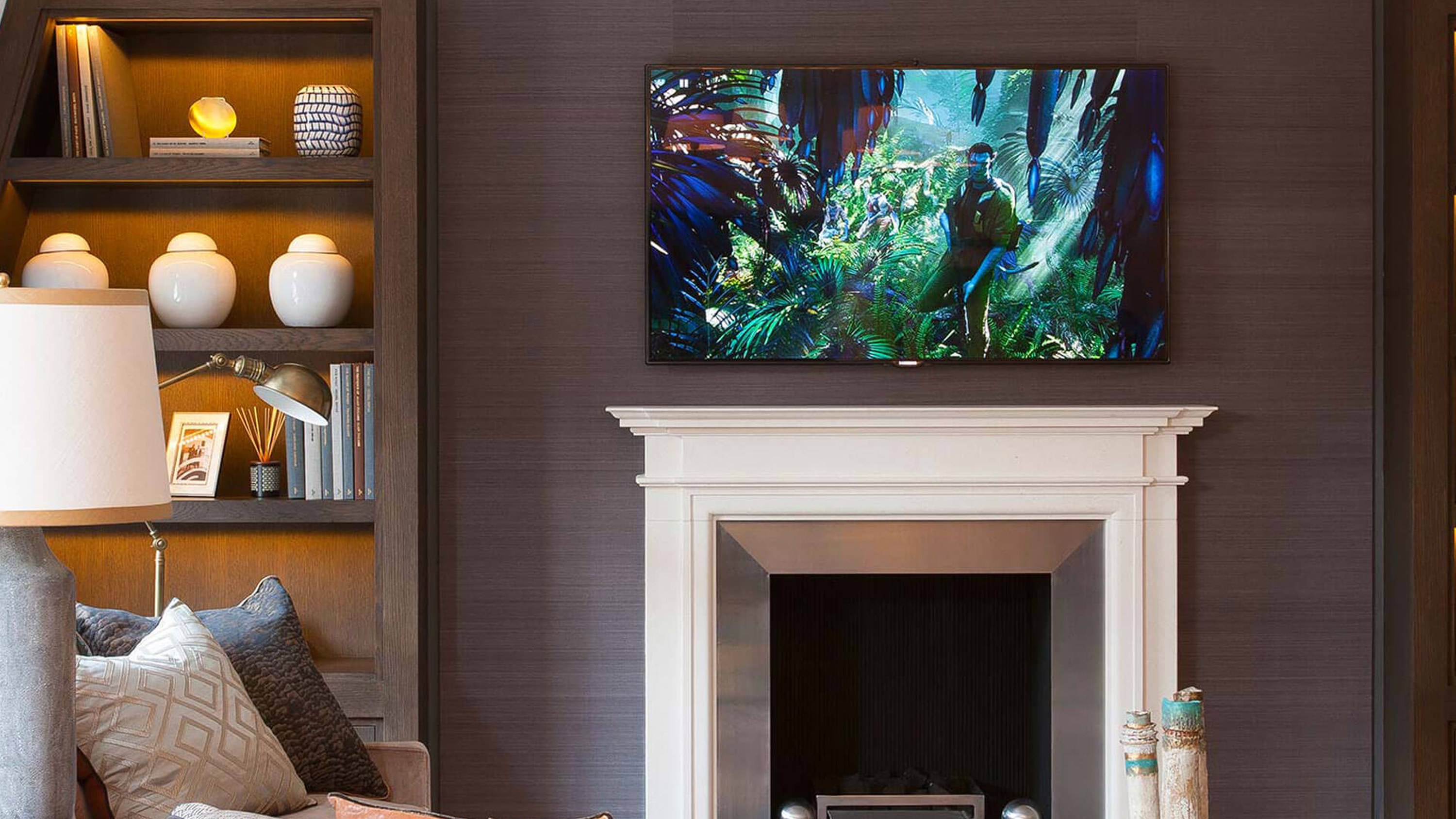 Future Automation TV wall mount above a fireplace