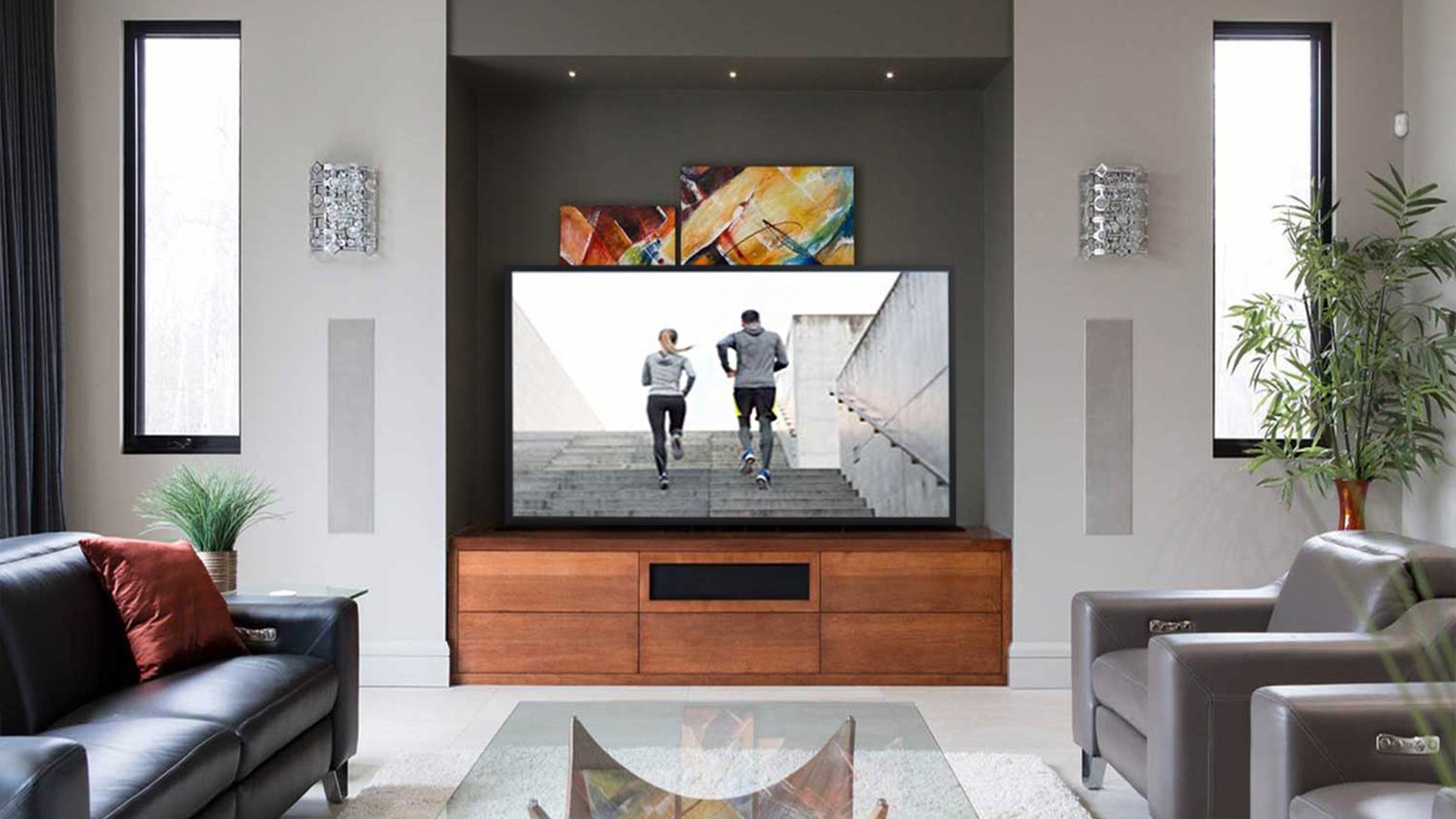 Nexus 21 pop-up TV lift raising a TV from a living room cabinet