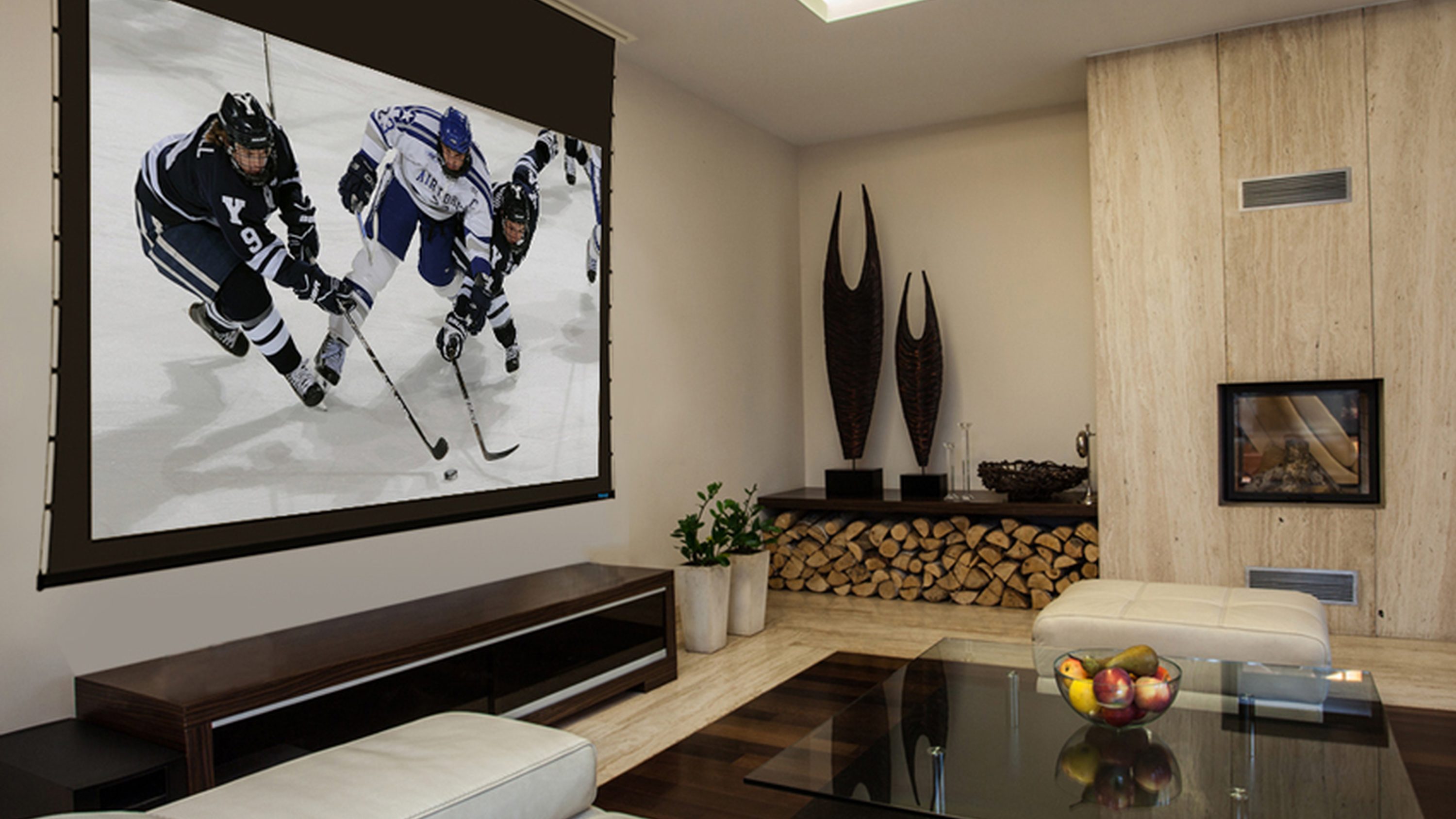 Stewart Filmscreen retractable screen in a living room