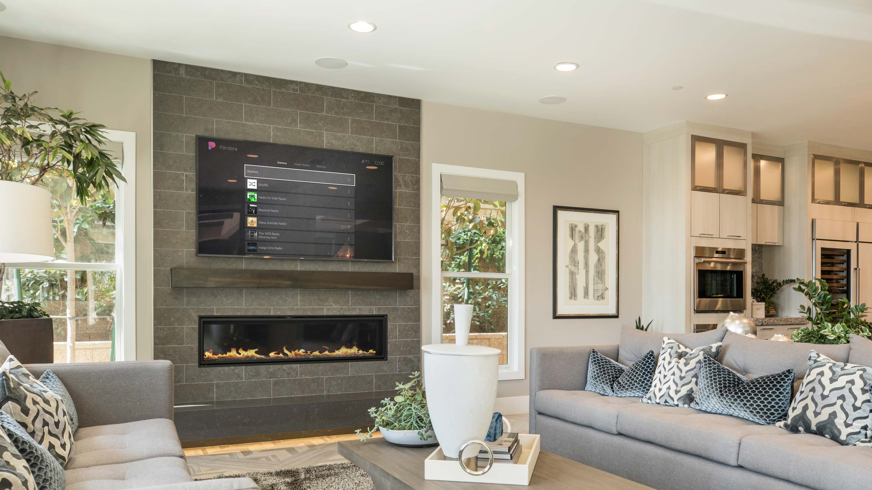 living room with control4 interface on tv