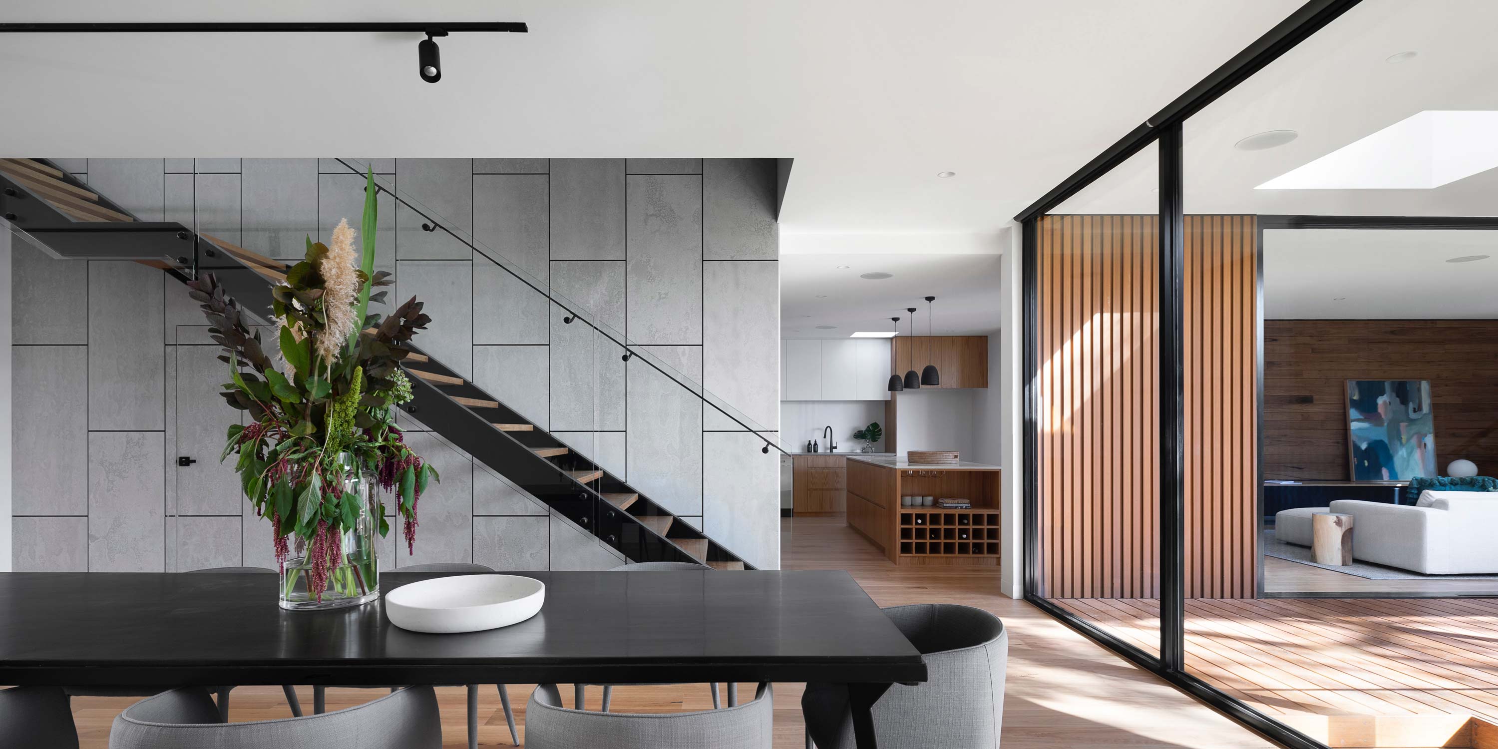 modern home with stone and wood accents