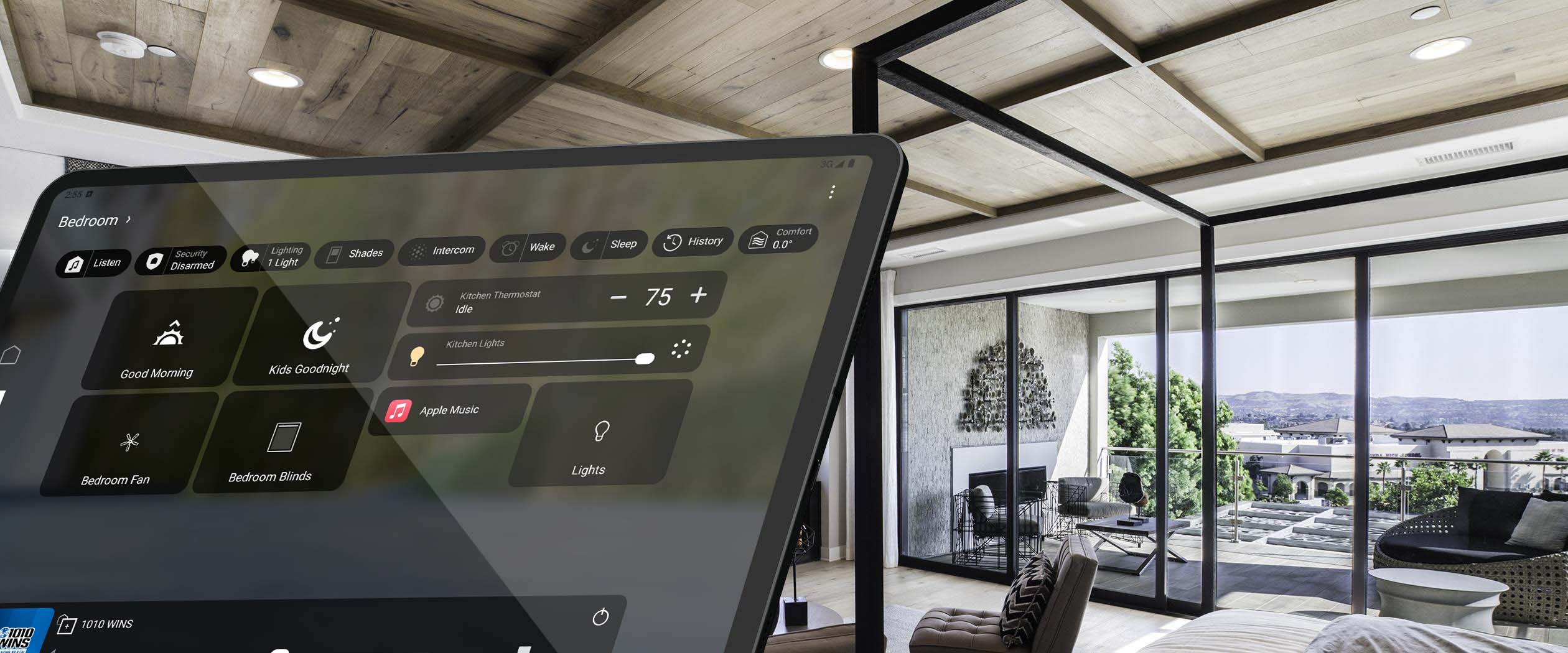 Control4 touch panel product in front of image of bedroom