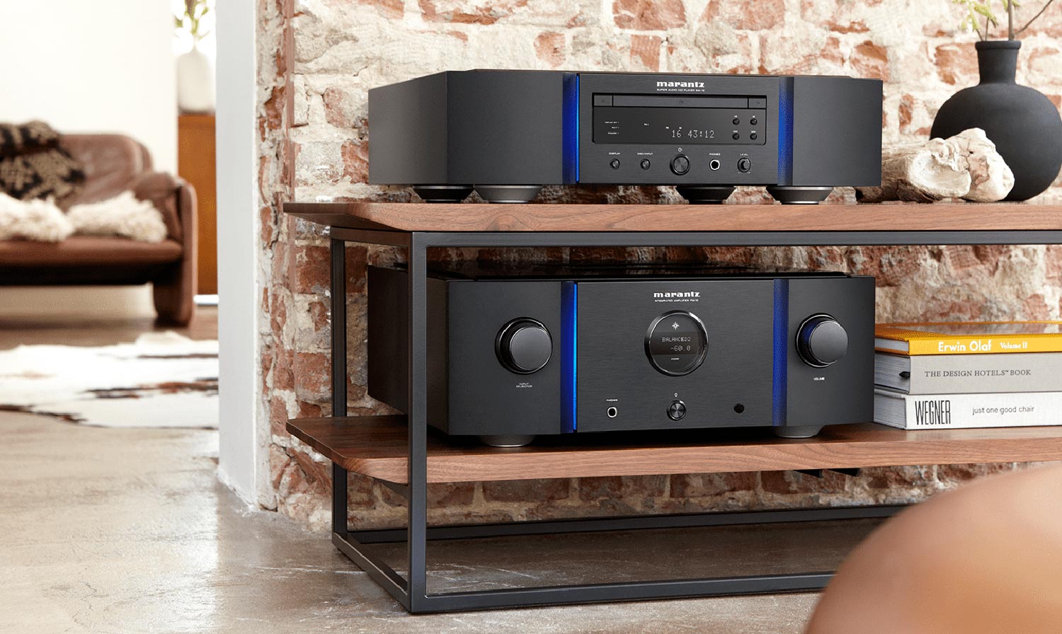 Marantz hi-fi components in front of a brick wall