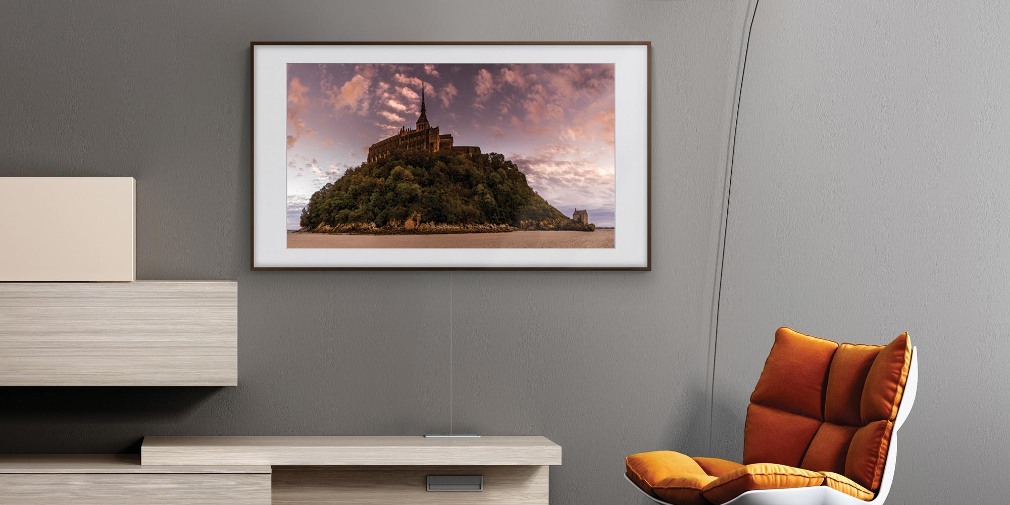 Samsung The Frame TV with a custom bezel on a grey wall