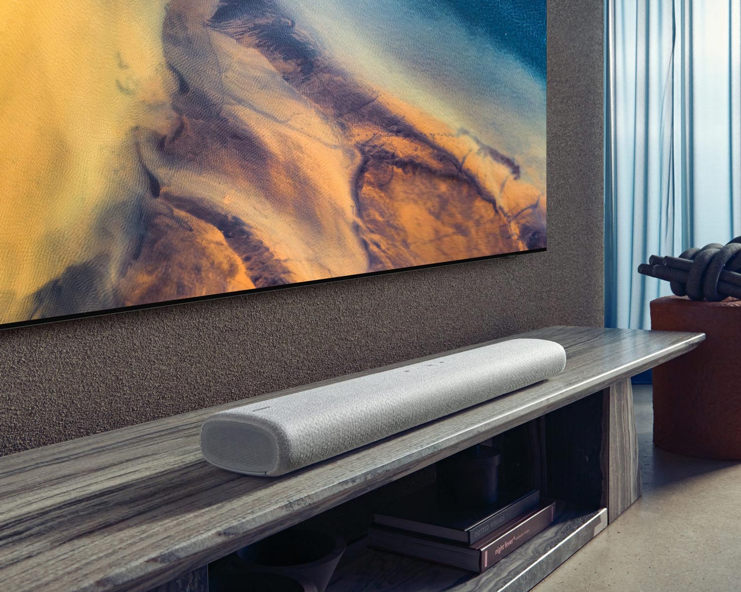 Samsung TV paired with a soundbar in a living room