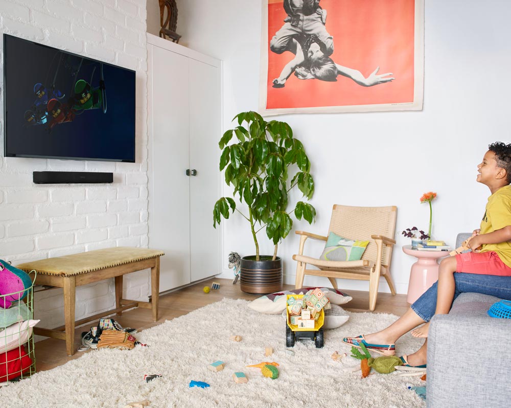 Sonos soundbar under the TV in a playroom