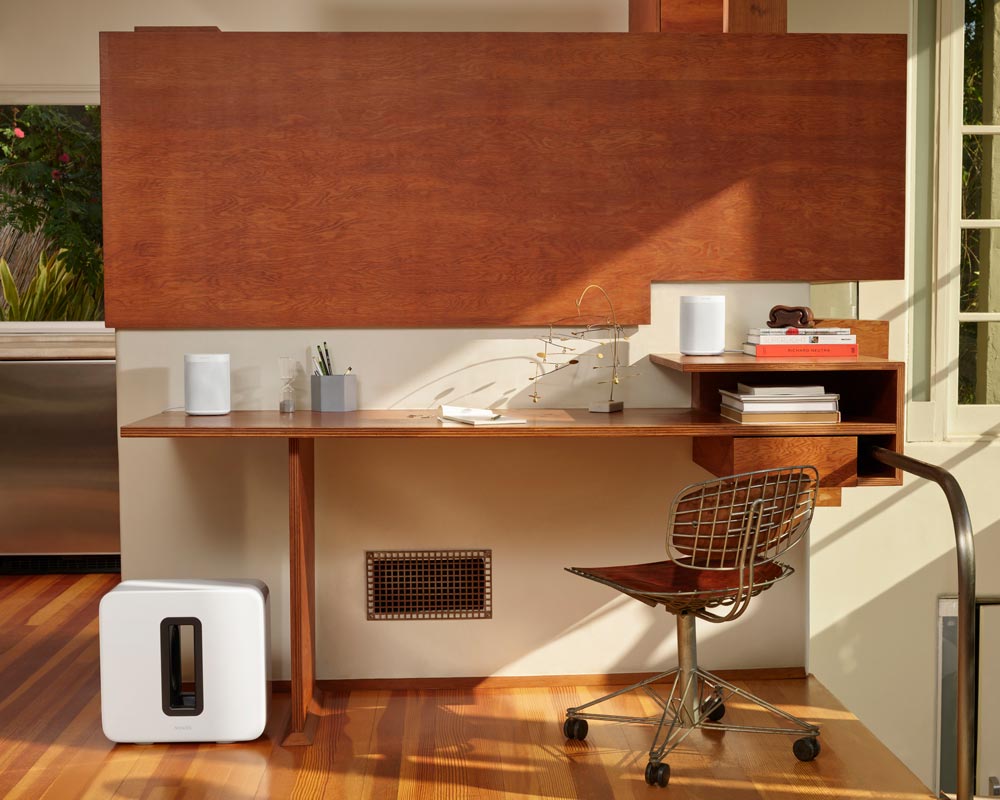Sonos speaker on a home office desk