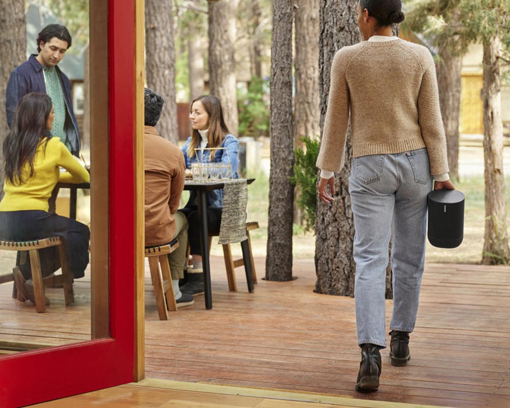 Portable Sonos speaker outdoors on a patio