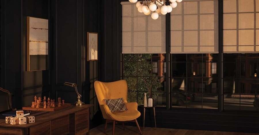 A luxury living room with Lutron Palladiom shades.